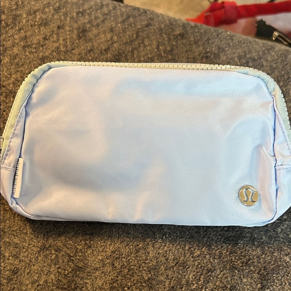 Lululemon Athletica Sky Blue Cosmetic Bag Gummy logo silver hardware.
